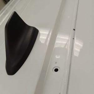 Ford Transit Connect front roof mounting point with protective cover removed