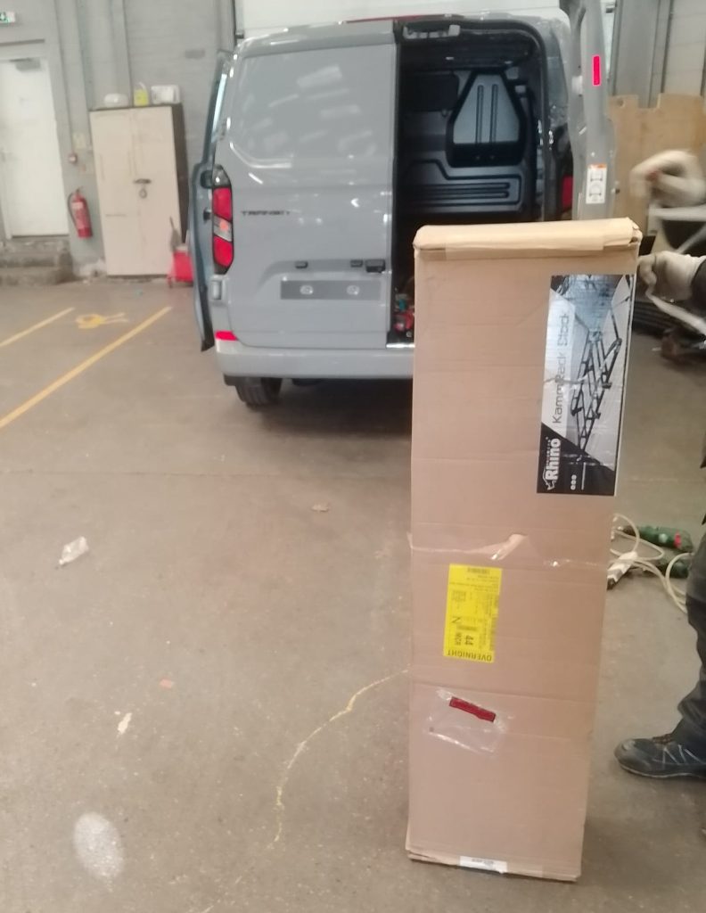 Ford Transit Custom with boxed Rhino Black KammRack